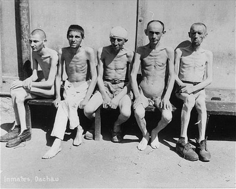 Prisoners liberated in Dachau. (Photo: Francis Robert Arzt, courtesy of USHMM Photo Archives.)